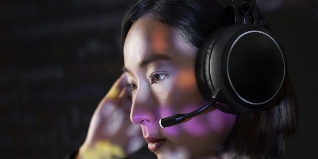 Female hacker cracking the binary code